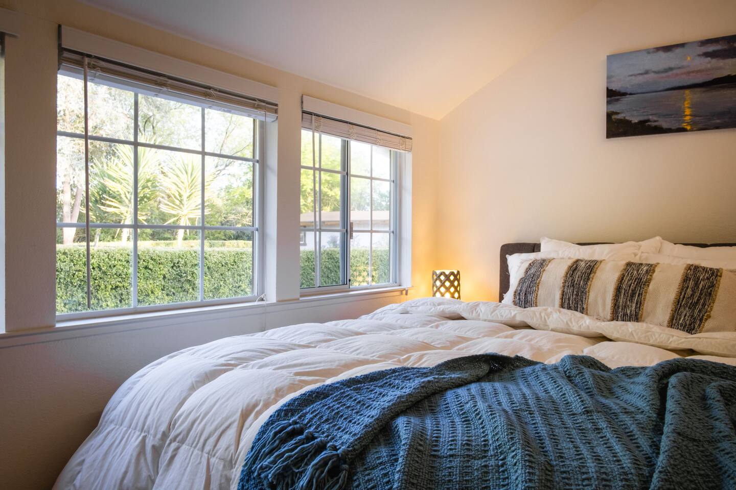 Relax in the cozy downstairs queen bedroom, complete with a TV for easy nights in.