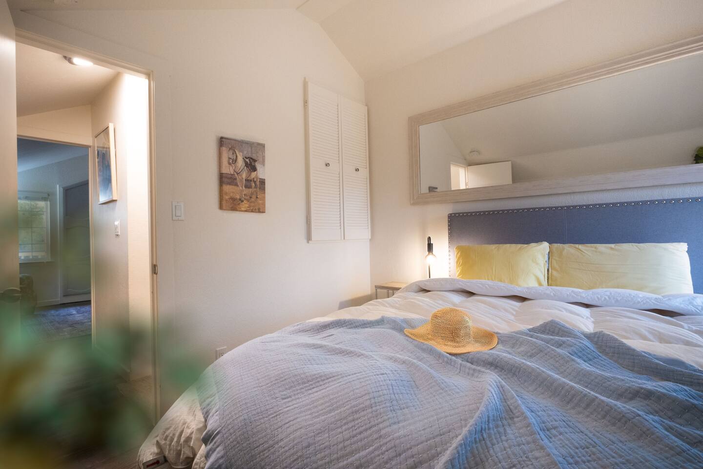 A cozy queen bedroom upstairs, offering peace and privacy for restful nights.