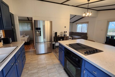 Kitchen with island and stainless appliances