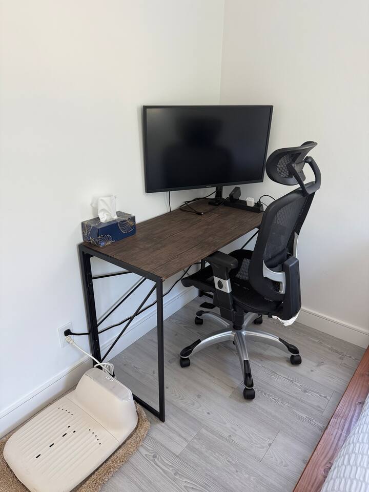 Ready for you to work remote with a 32in 4K Samsung Monitor, HDMI cable, and desktop power strip.