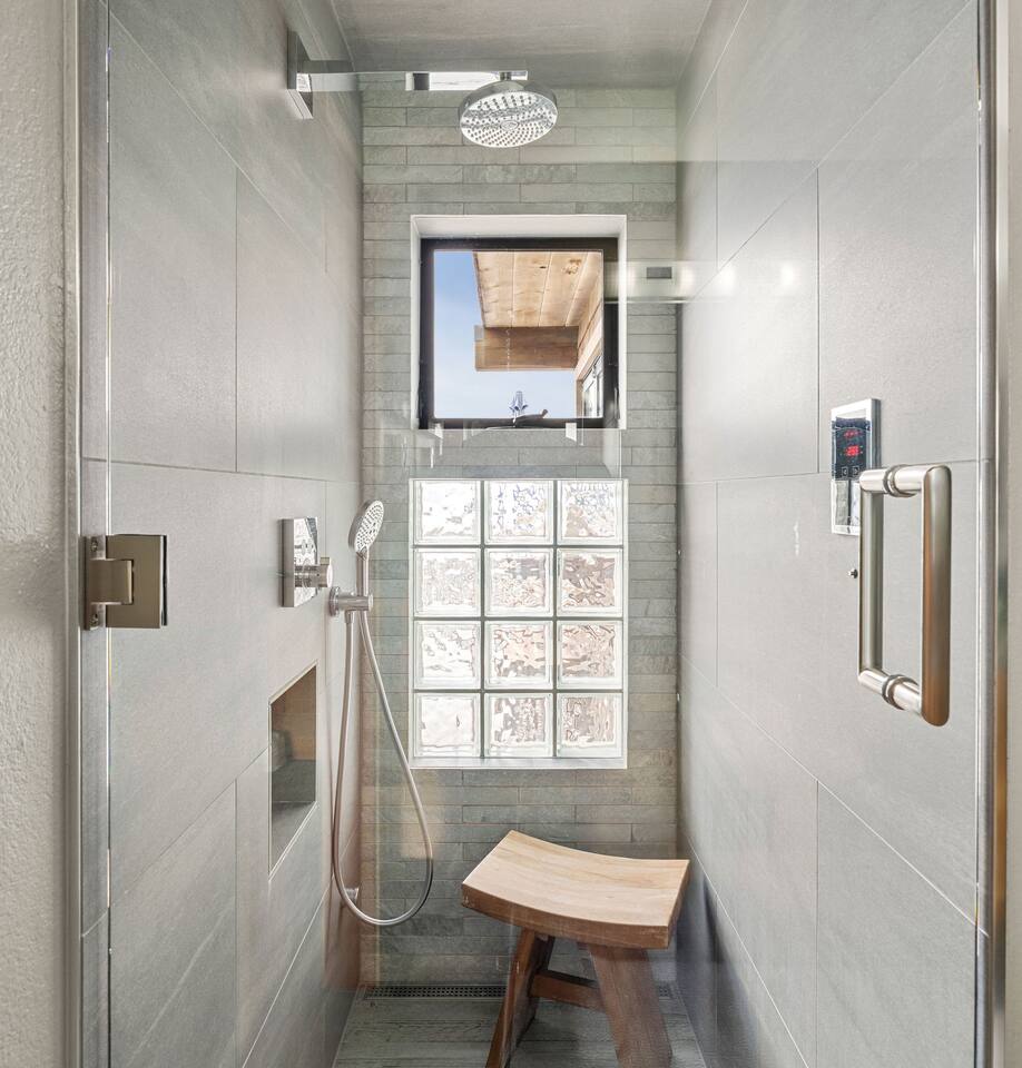 The kind of bath or shower that turns routine into ritual, where the stress of travel disappears.