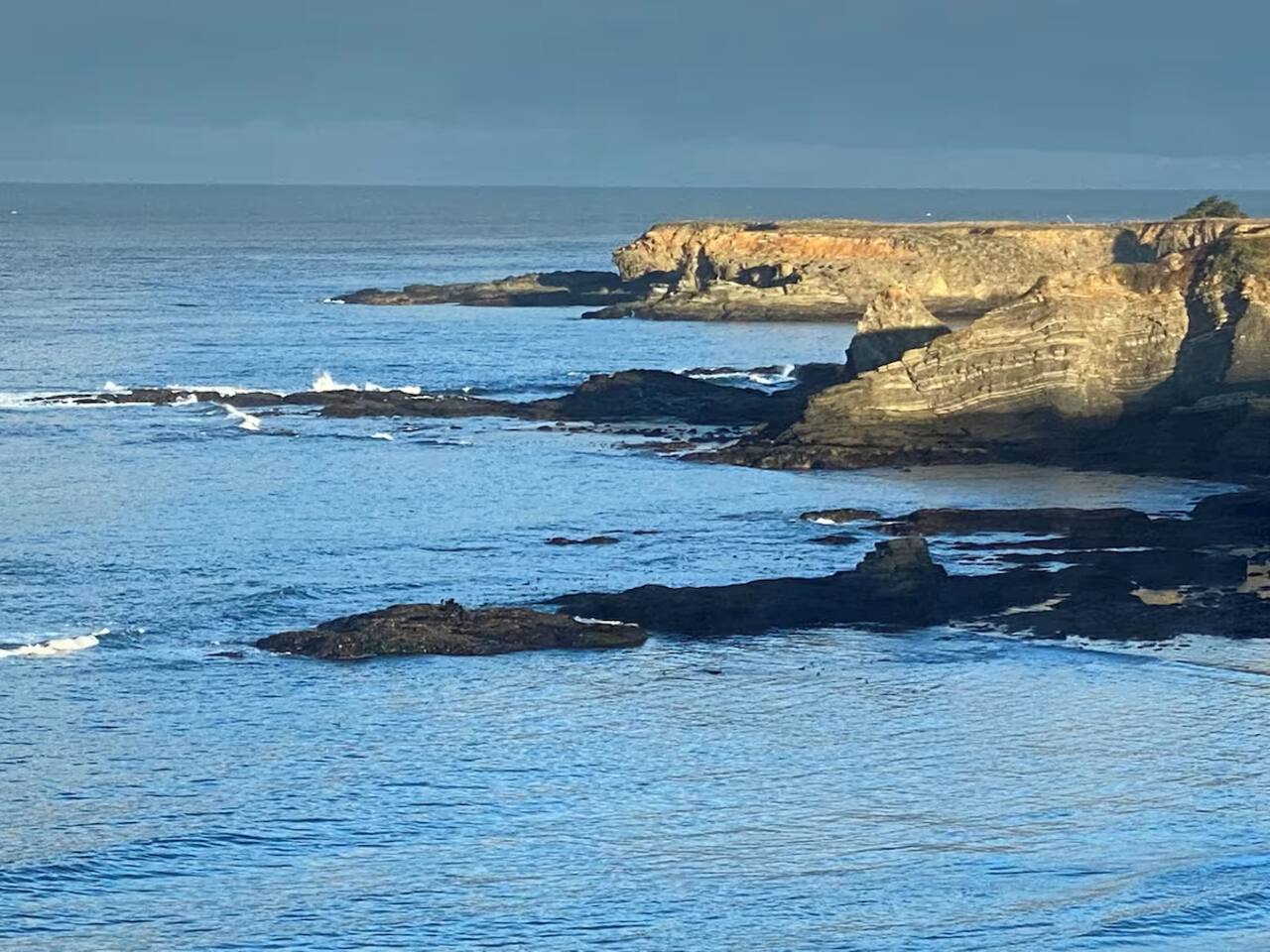 There’s nothing between you and the edge of the world—just ocean, sky, and that gentle rhythm.