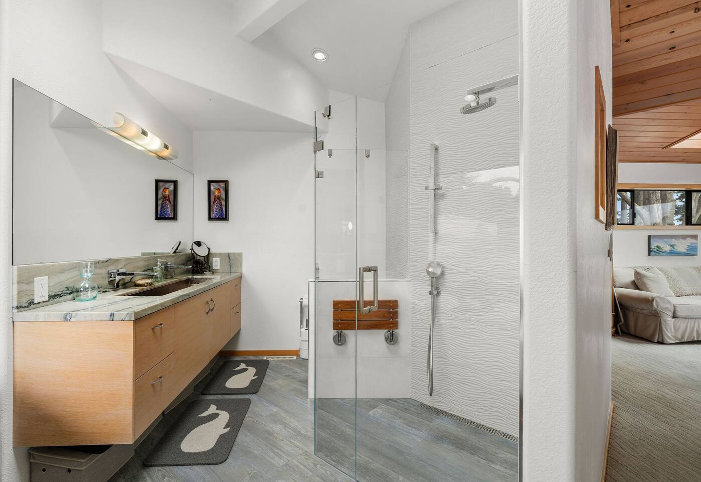 Unwind in a spacious bathroom featuring a soaking tub after a day out. 