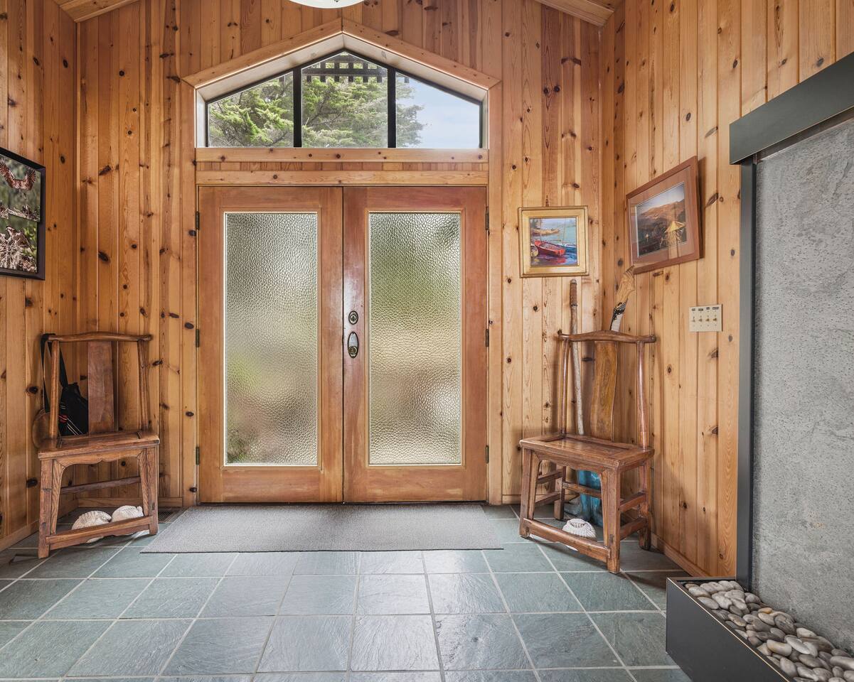 There’s something grounding about walking up to the house, weathered wood and sea air guiding you in.