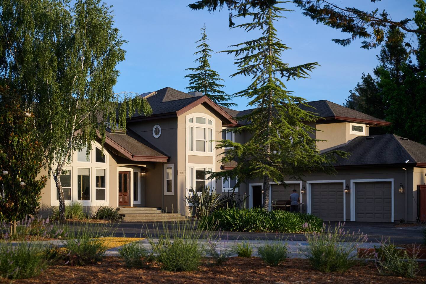 The scent of lavender lines the path as golden light dances on the windows.