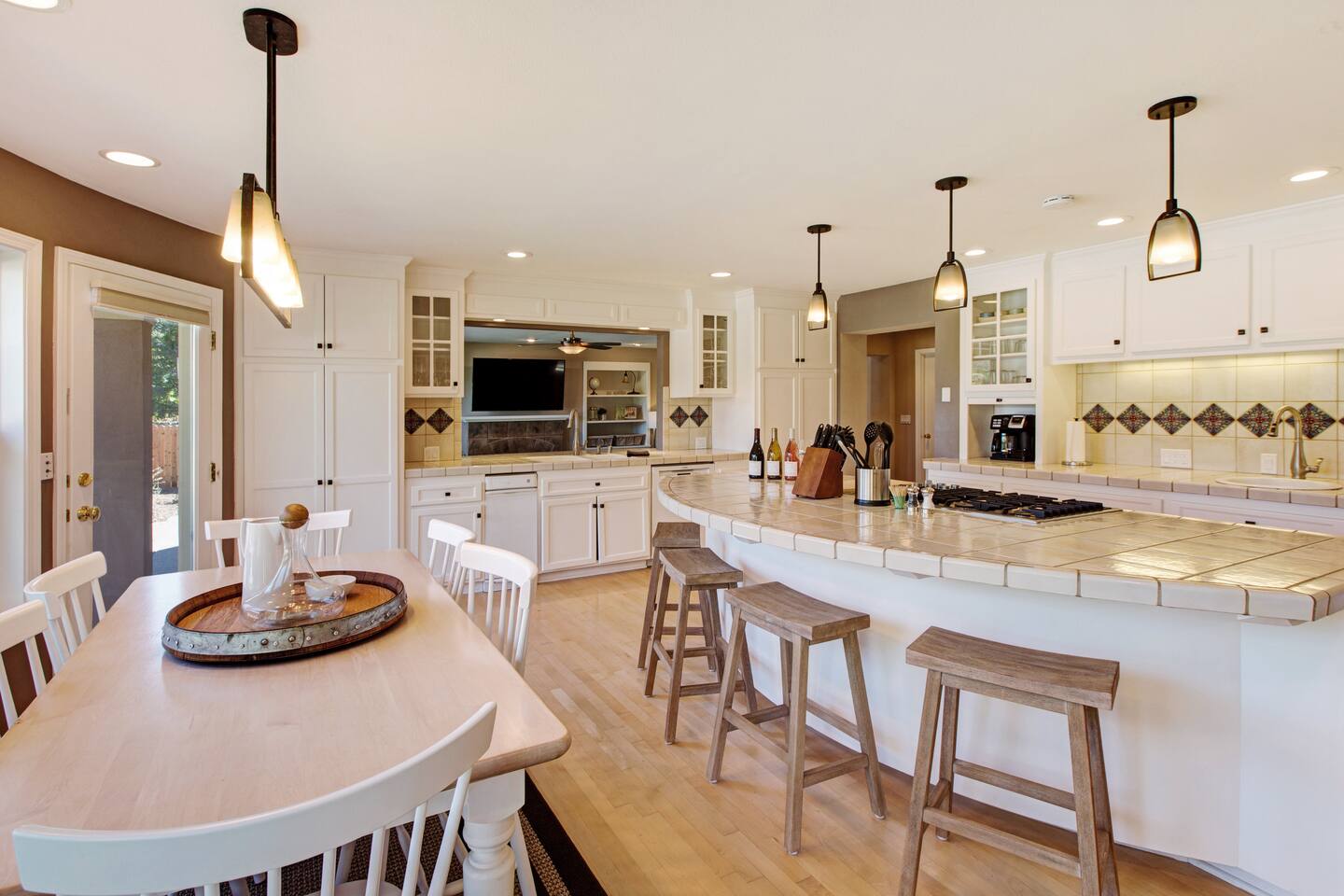 Clink of glasses, soft chatter, and the aroma of something simmering—this is where memories are seasoned.