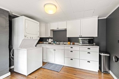 That's a stacked washer and dryer for your convenience. We put a microwave down here for those that just need 