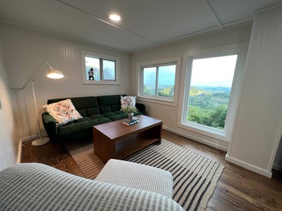 From the living area in the lower level, you can see just as far as you can from the deck.  Oh, and that is a 