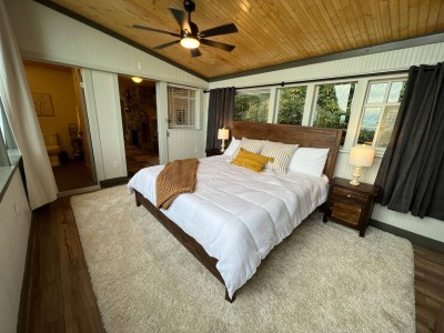 The master suite has windows on all four walls letting in light from every angle and nearly 270 degree views.