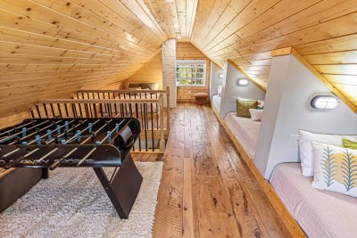 Here's a wide shot of the whole clubhouse.  There are three comfy twin mattresses up  here a queen bed and too
