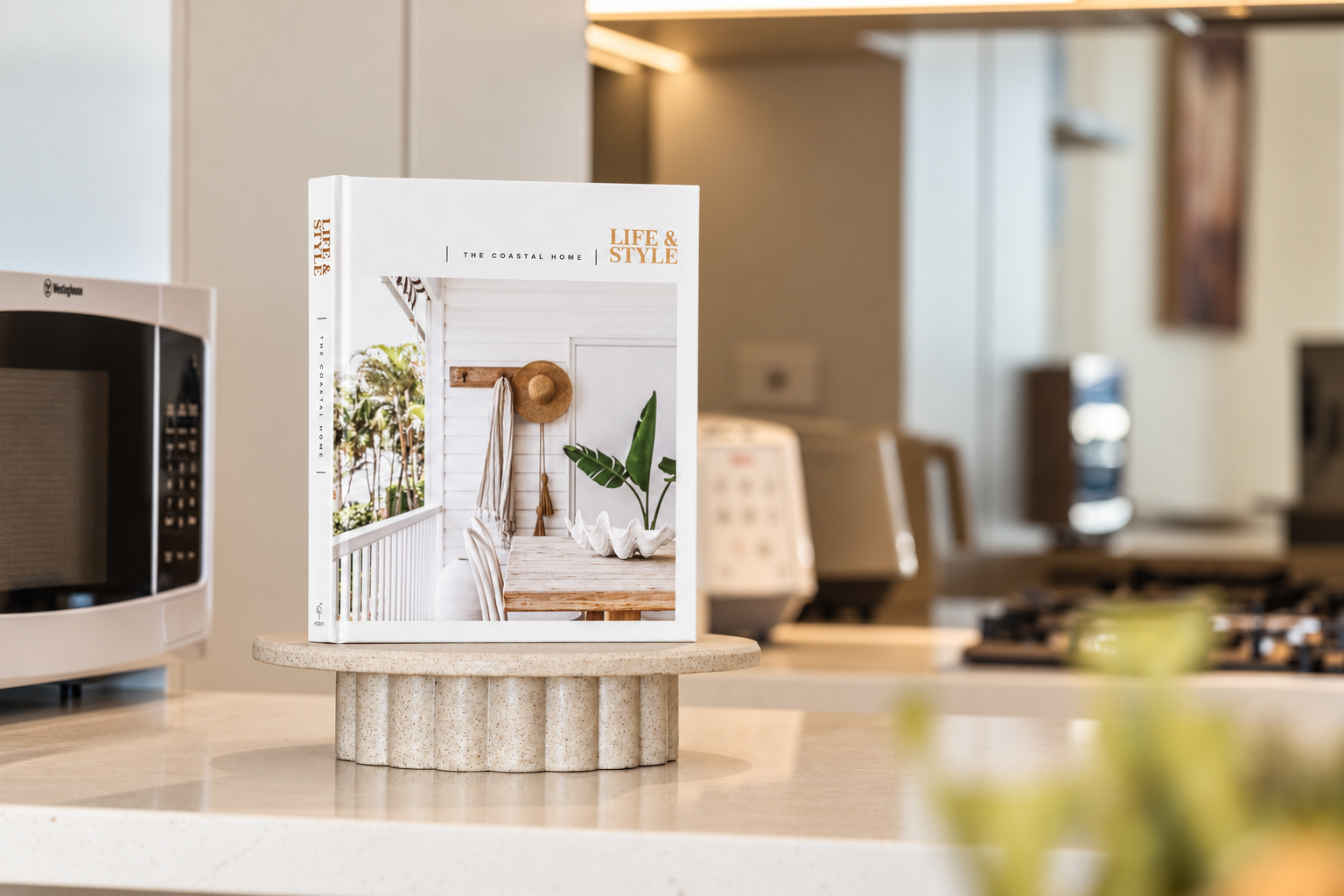 Bright modern kitchen with sleek finishes and thoughtfully styled decor