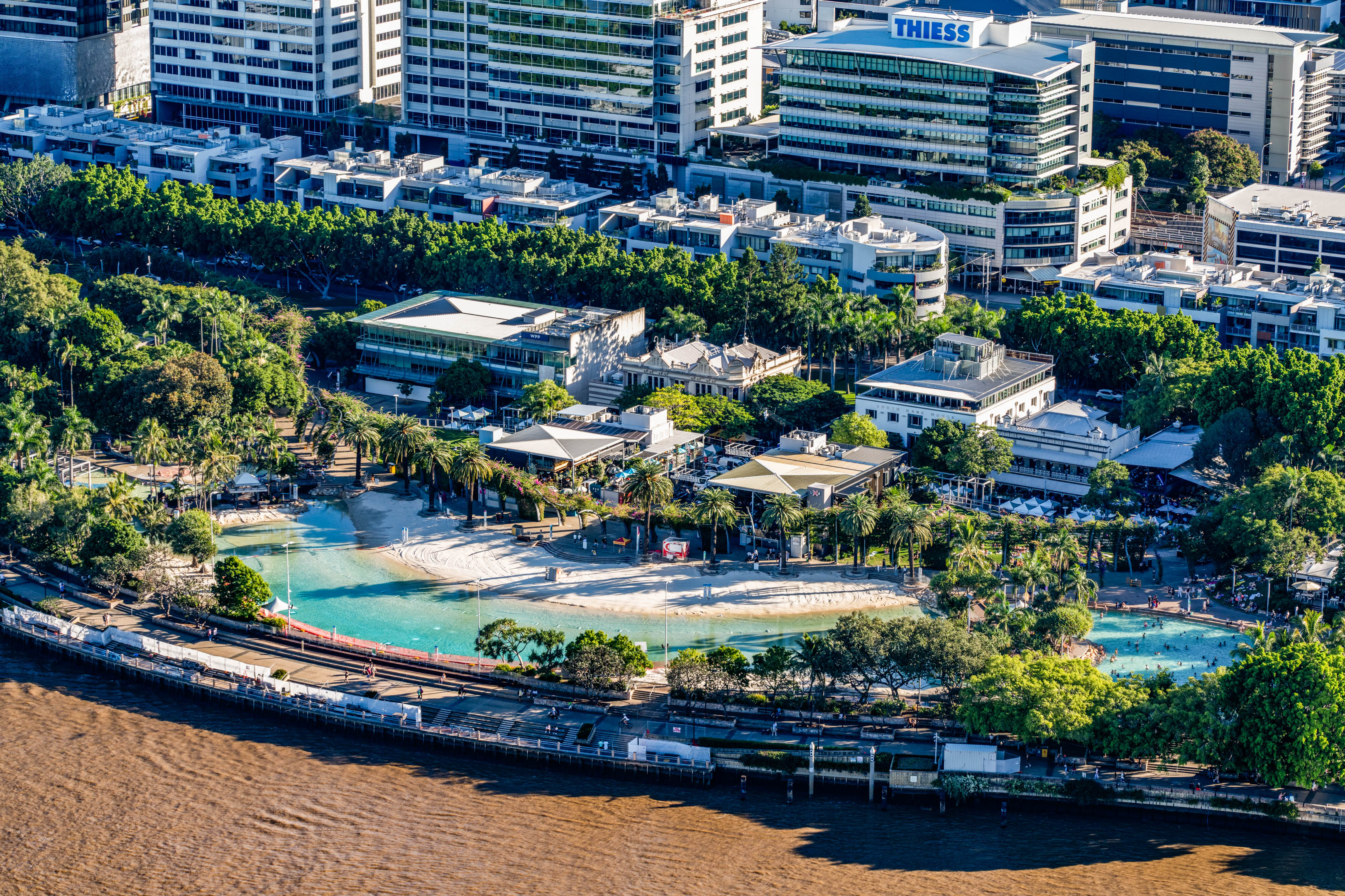 Resort-style lagoon pool oasis in a prime waterfront city location