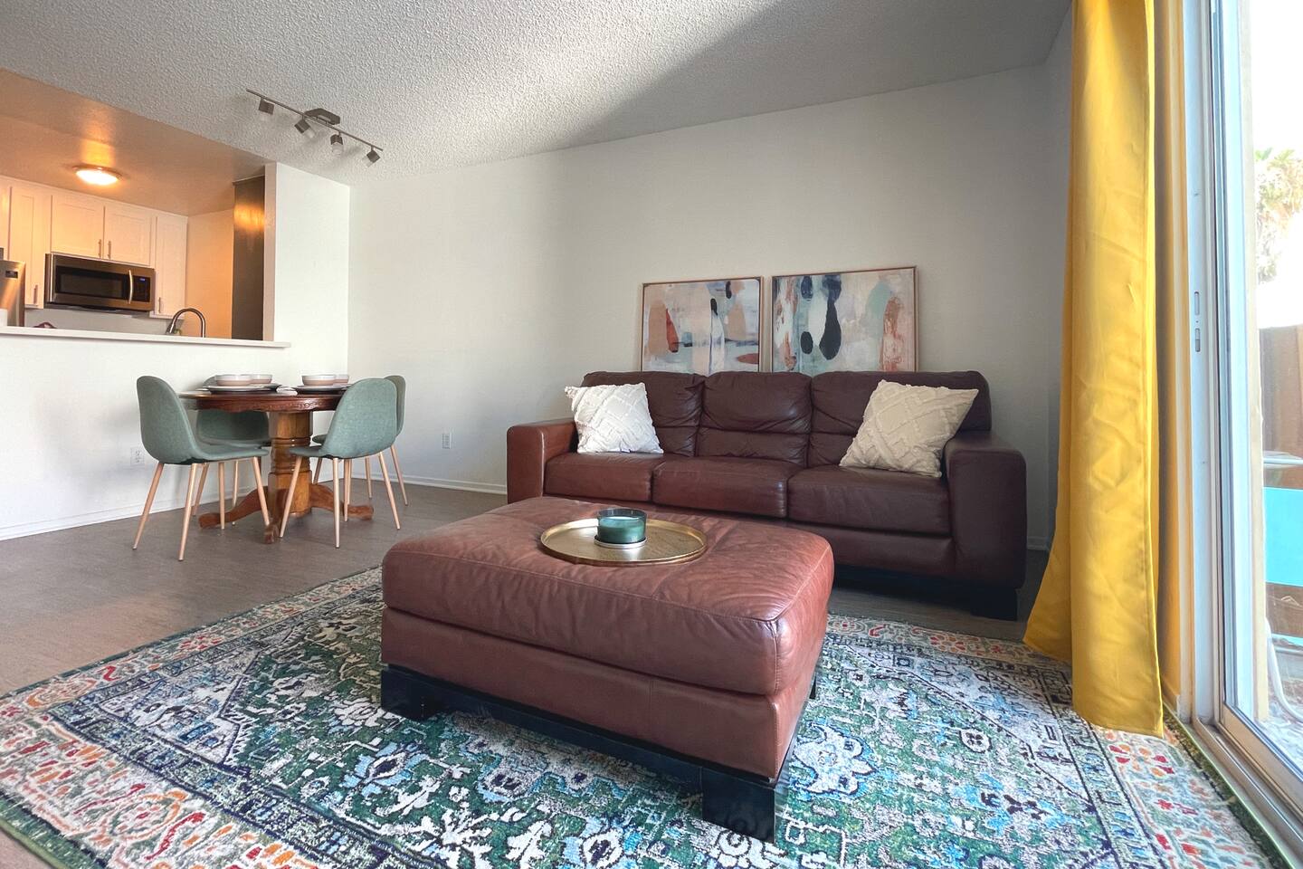 Lovely 1 Bedroom Unit with Garaged Parking