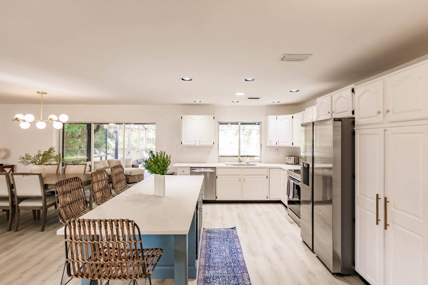 Gorgeous kitchen with stainless appliances, quarts counters, 7 ft island and bonus fridge in the garage. Kitchen Features Cookware, Coffee, Tea, Sugar, Creamer and spices.

Kitchen window accesses outdoor bar.
