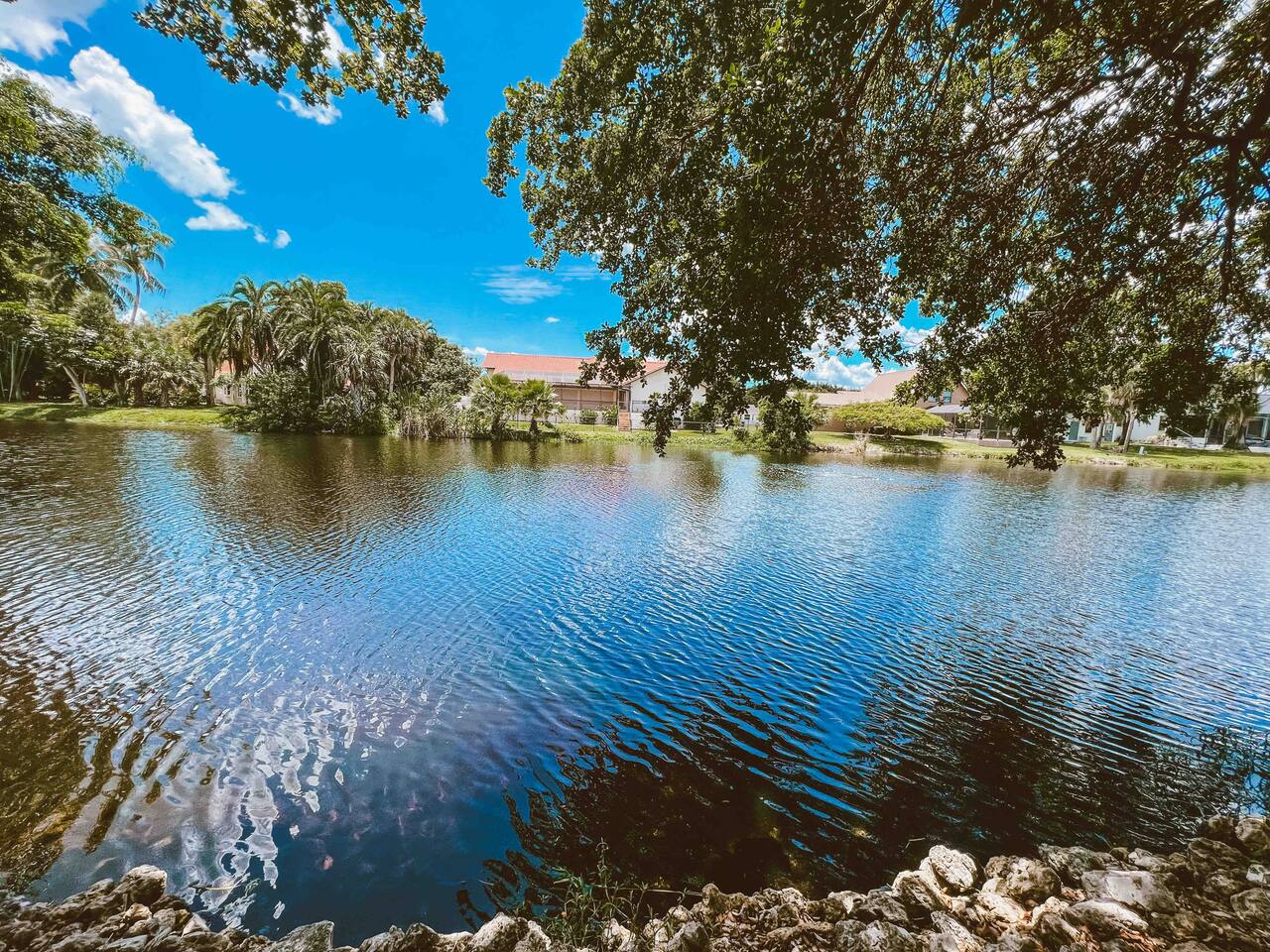 Beautiful lake directly behind home. Enjoy sunsets while lounging on the lanai.