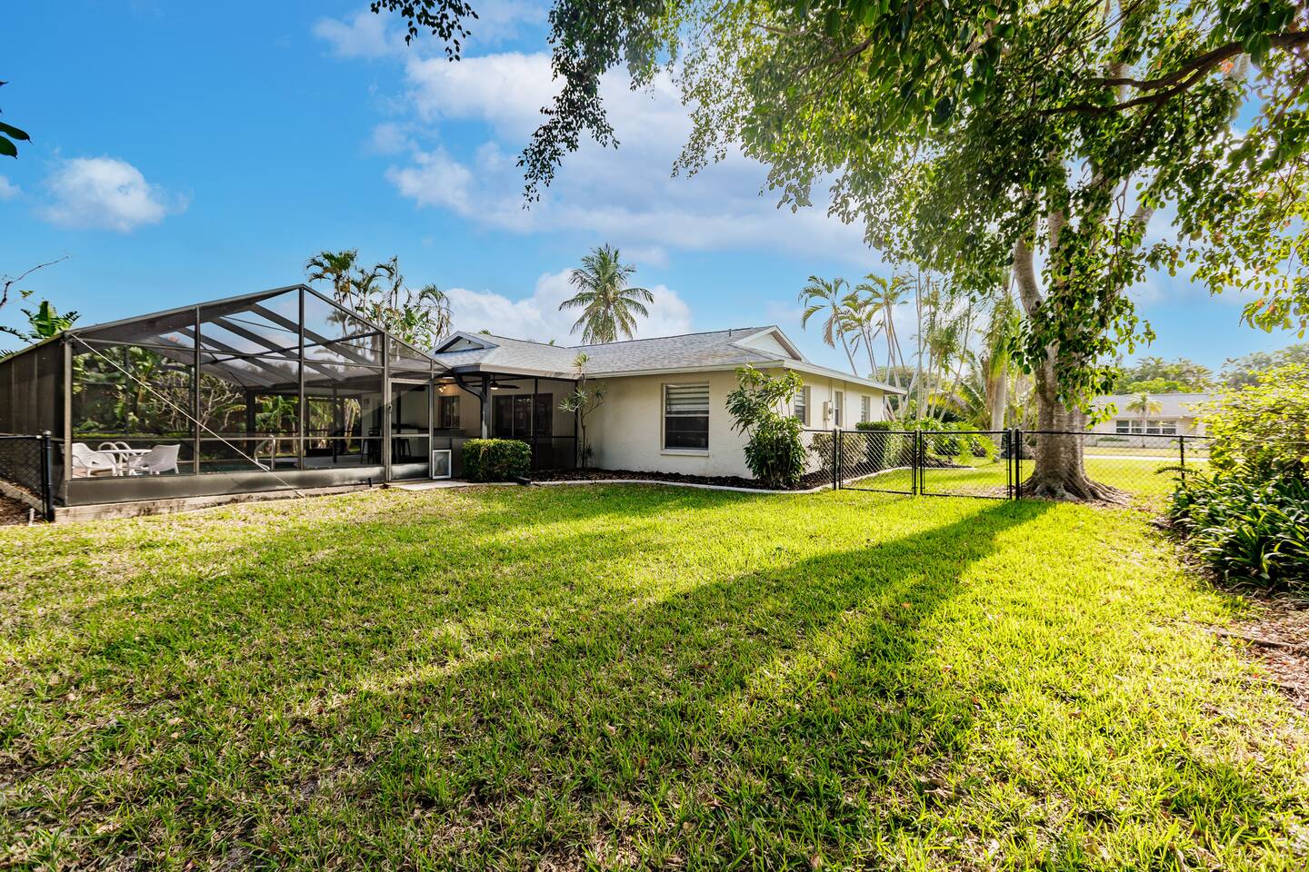Large 1/2 acre lot with fenced backyard area.
