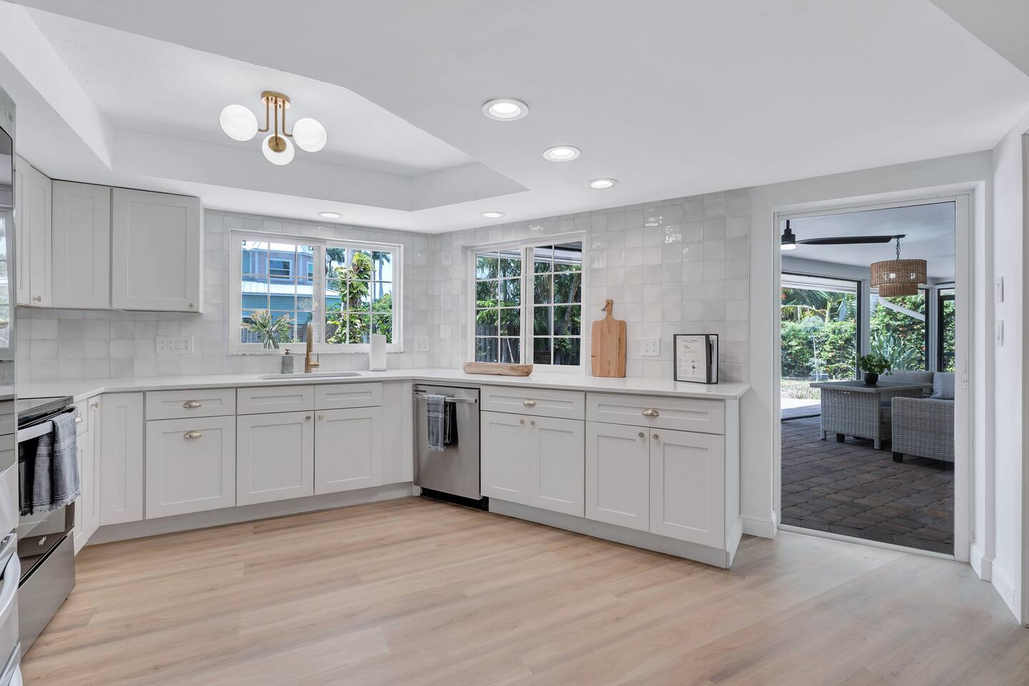 Gorgeous kitchen with stainless appliances and quarts counters. Kitchen Features Cookware, Coffee, Tea, Sugar, Creamer and spices.

Kitchen window accesses outdoor bar counter