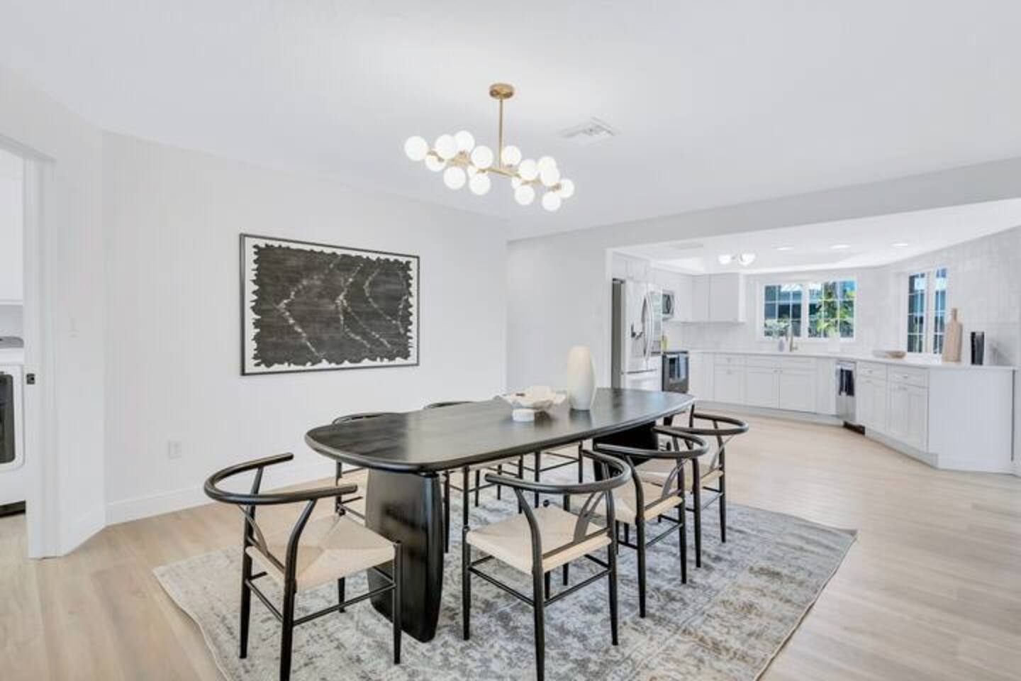 Dining room with 8 chairs (two additional chairs can be pulled up from the seating area around the corner)