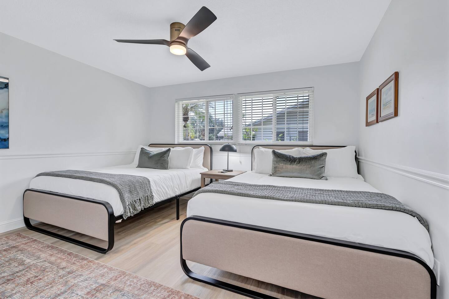 Two Queen Bedroom. Featuring a 55" TV and walk-in closet.