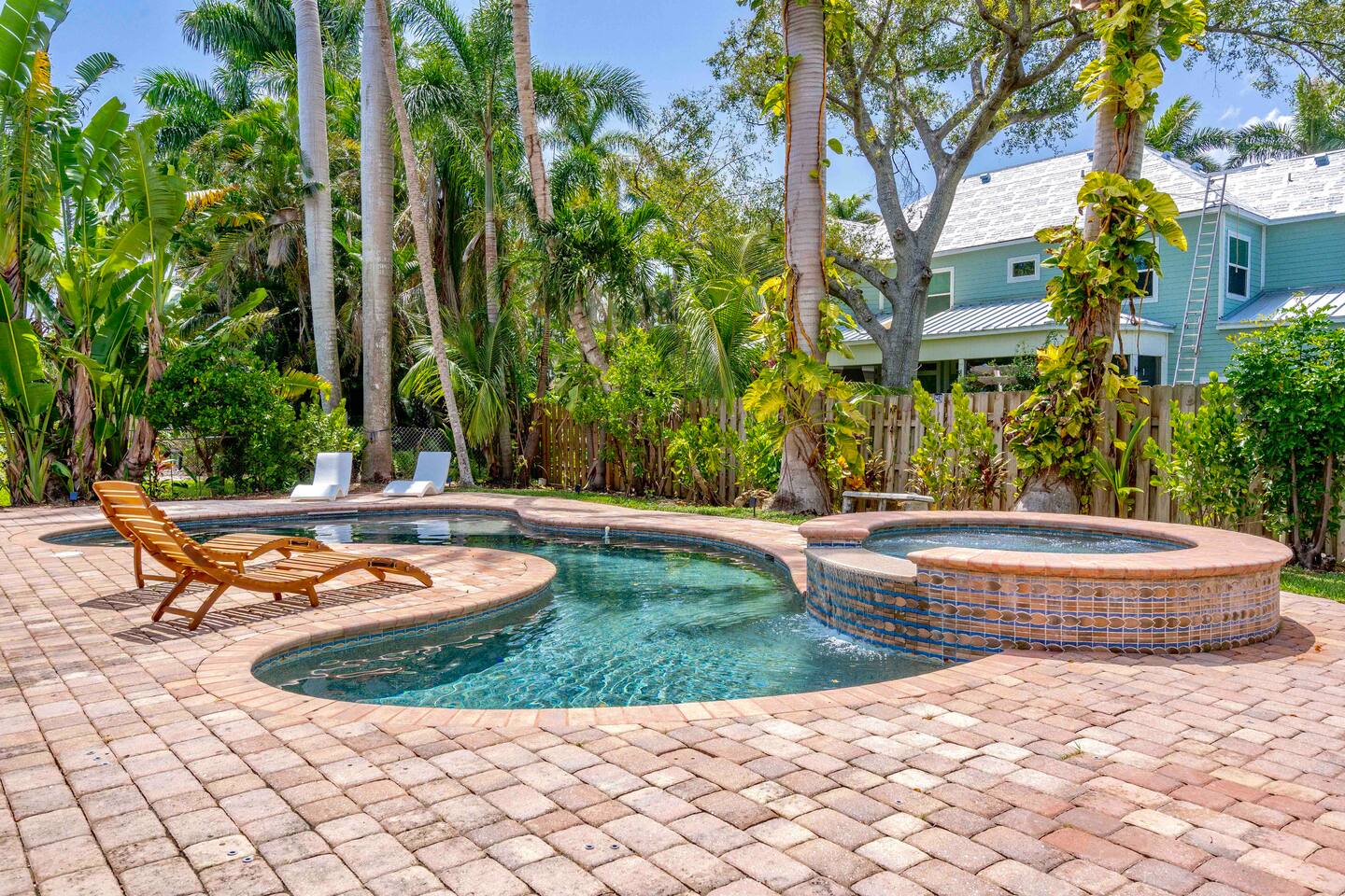 Spectacular pool and spa. Featuring fountains, baja shelf, in pool seating and sun loungers.