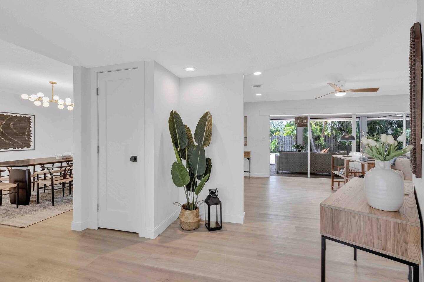 Entryway with coat closet. (Pack-n-play and baby booster seat are kept in this closet)