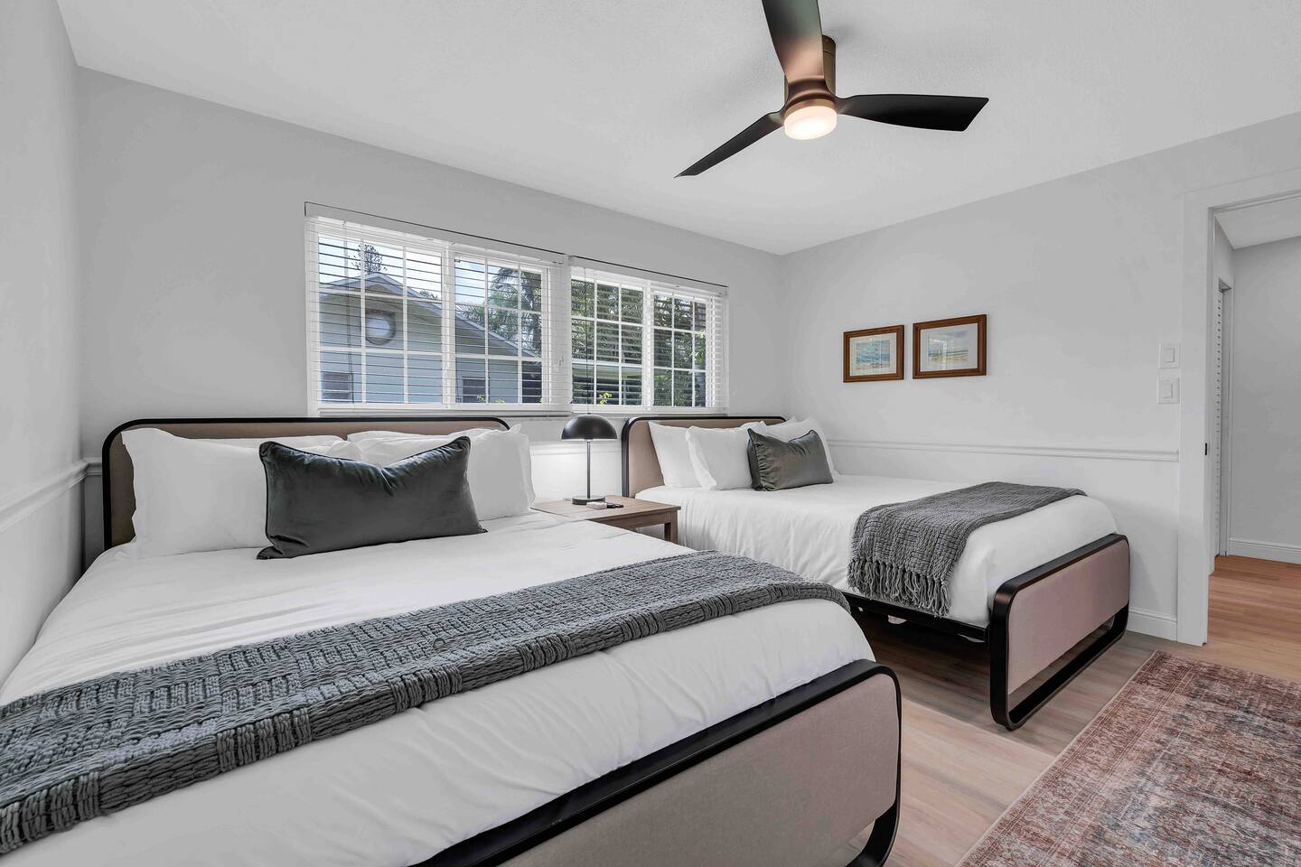 Two Queen Bedroom. Featuring a 55" TV and walk-in closet.