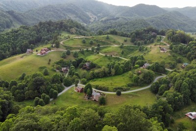 Aerial view of rolling hills with views in the neighborhood. Enjoy  a beautiful 1/2 mile walk through the neighborhood with views of Sugar Mountain and Tater Hill. 