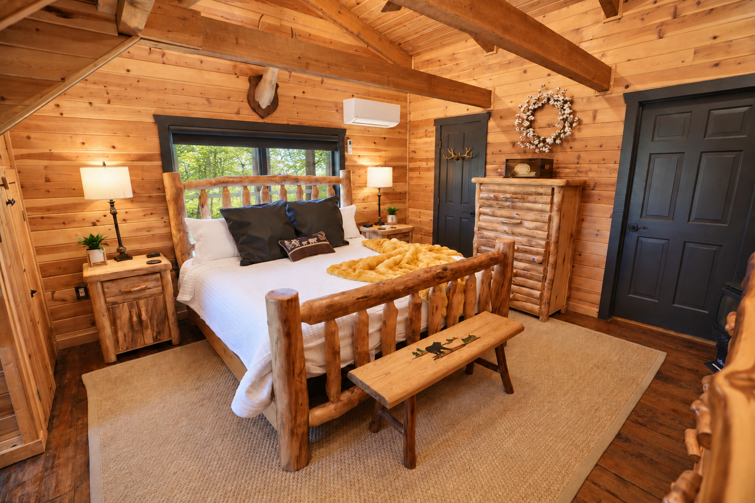 Cozy rustic cabin bedroom with log furniture and epic Blue Ridge Mountain Views