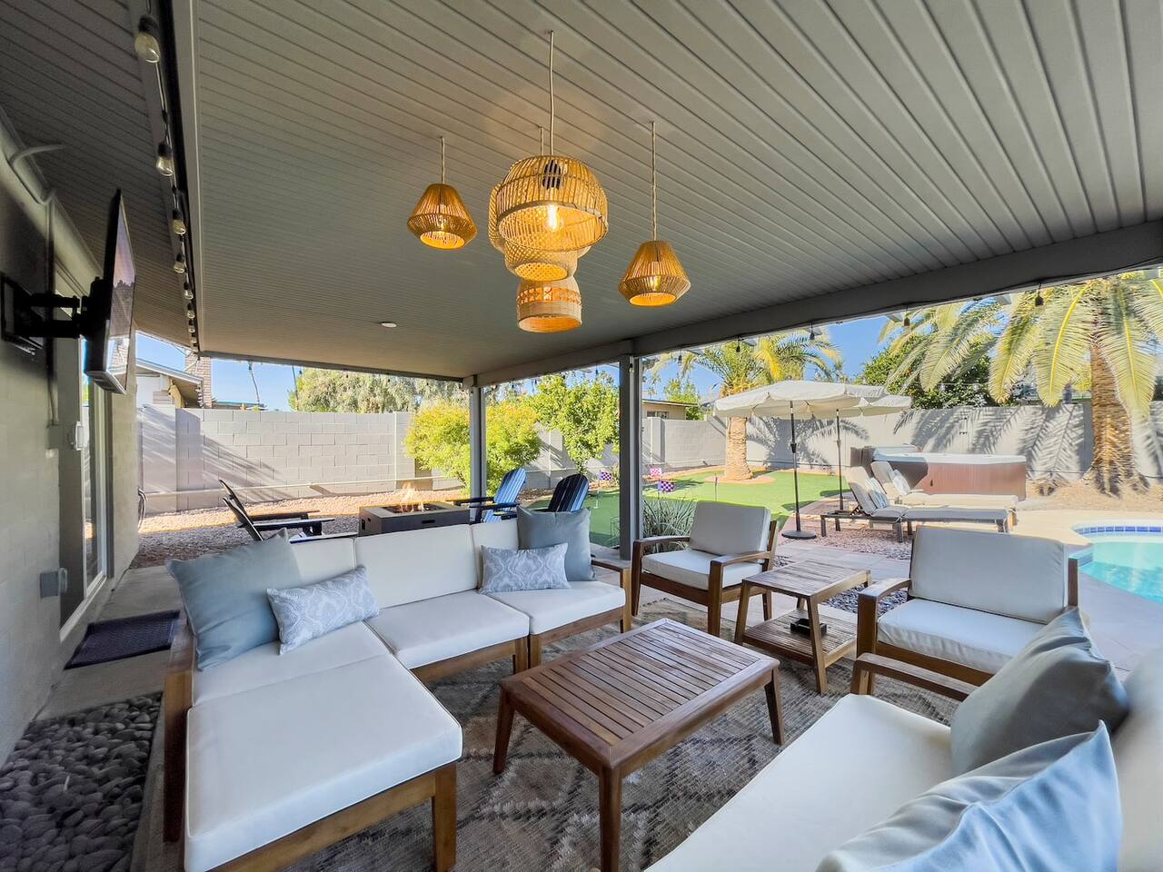 Loungers with outdoor TV. All TVs come with Disney+ and Hulu.