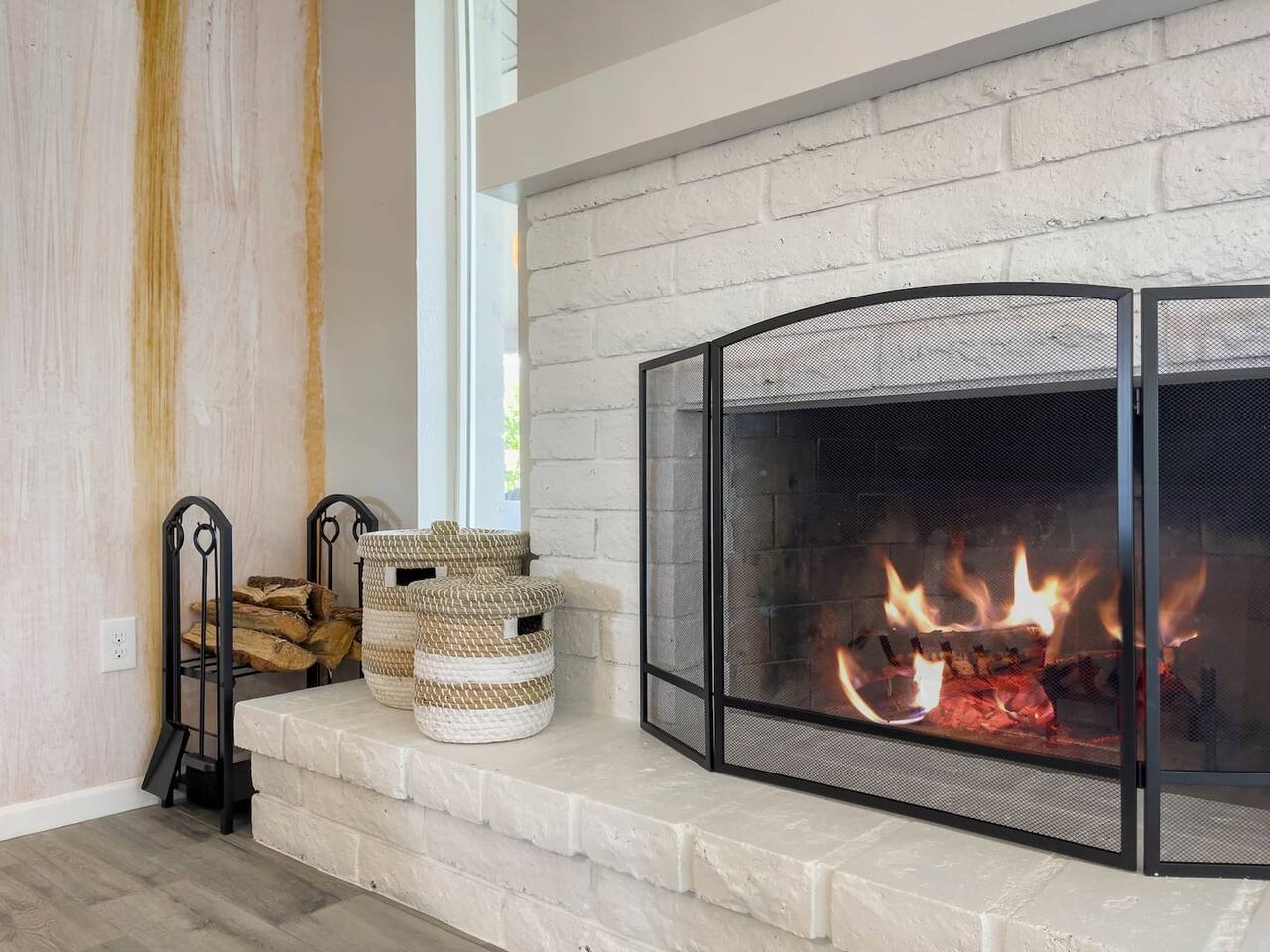Spacious living room with wood-burning fireplace