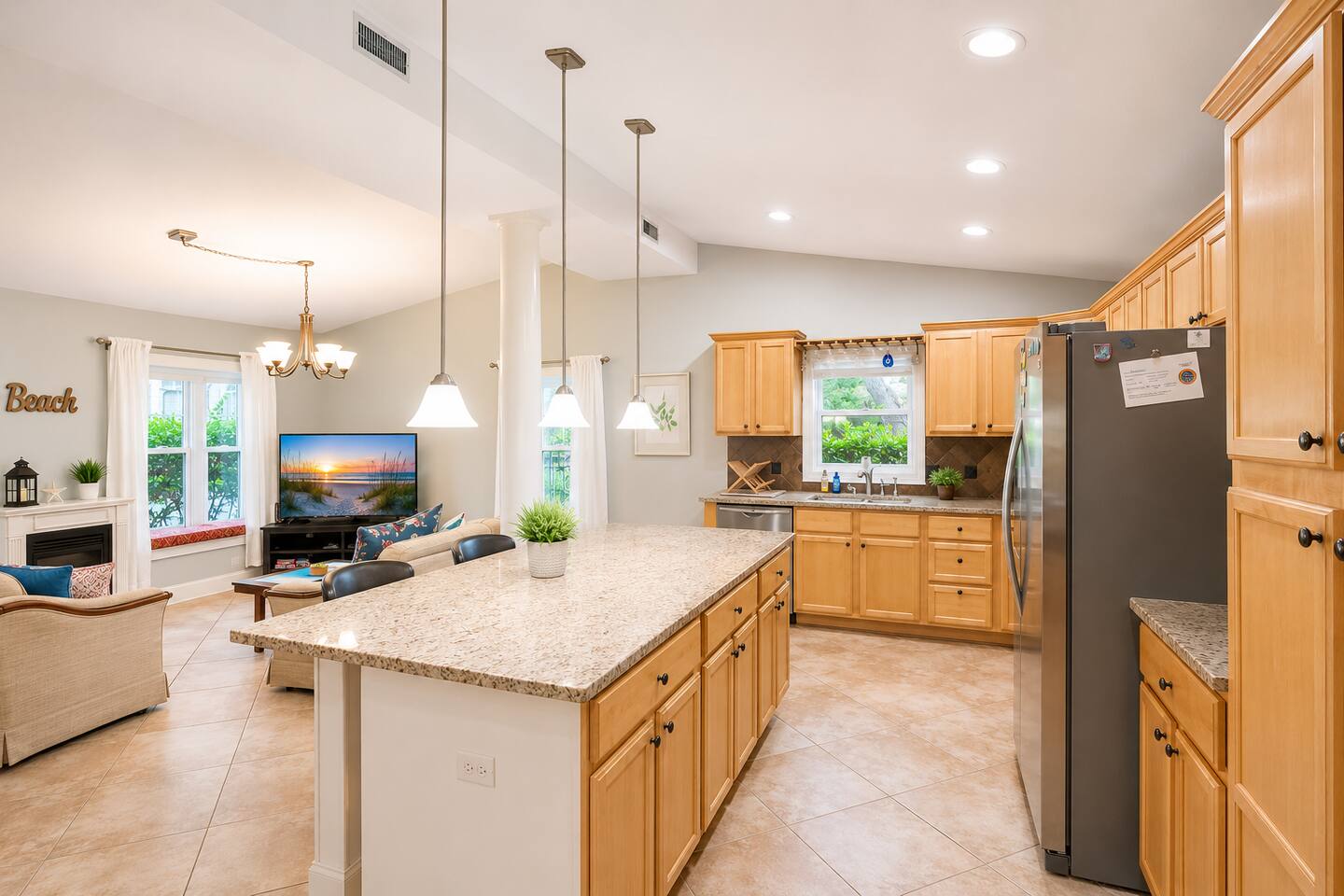 Dining area with seating, perfect for family dinners and island feasts