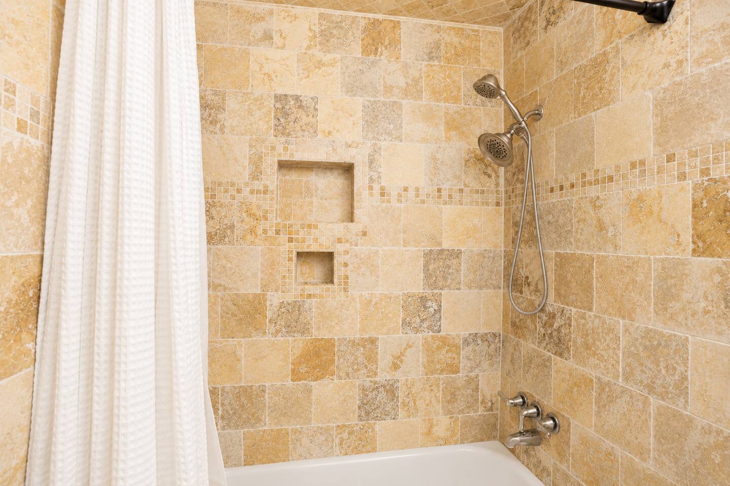 Bright, modern bathroom — unwind after a day on the St. Simons Island shoreline.