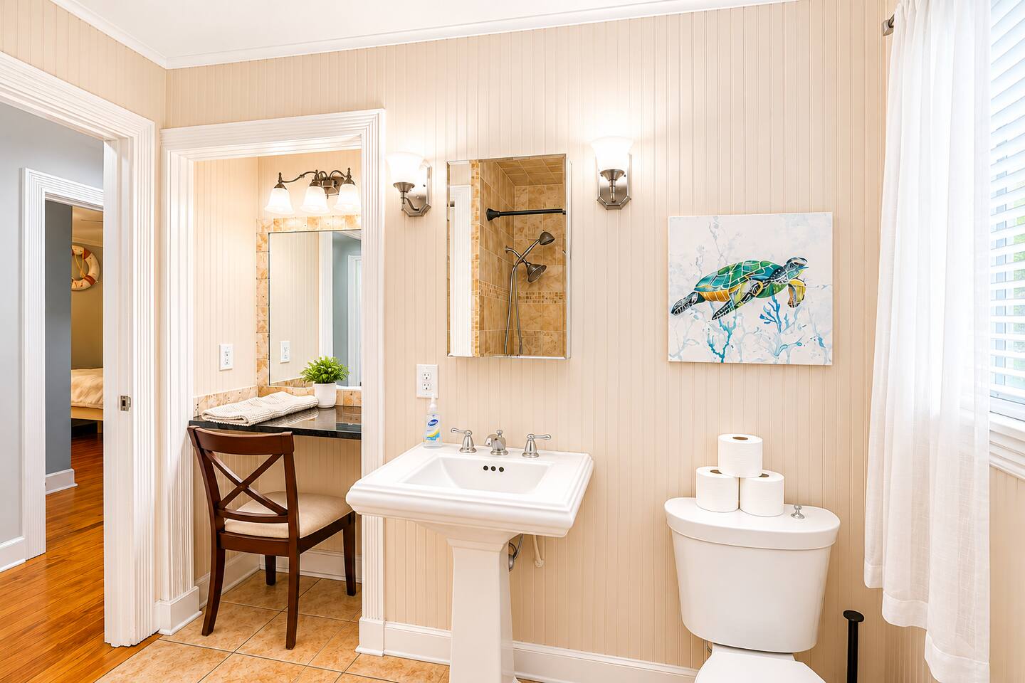 Bright, modern bathroom — unwind after a day on the St. Simons Island shoreline.