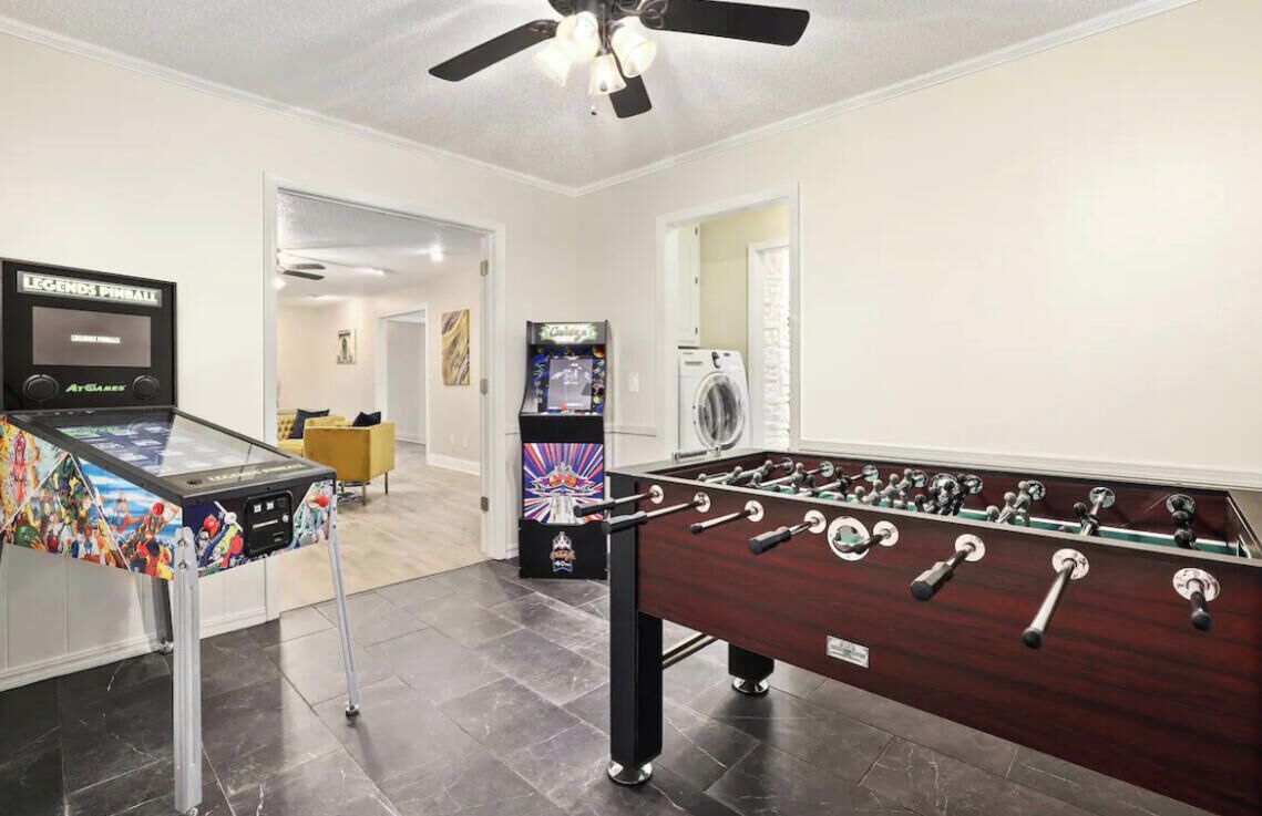 Inside, our Game Room has a Foosball table, Pin Ball table and Galaga Arcade game console.