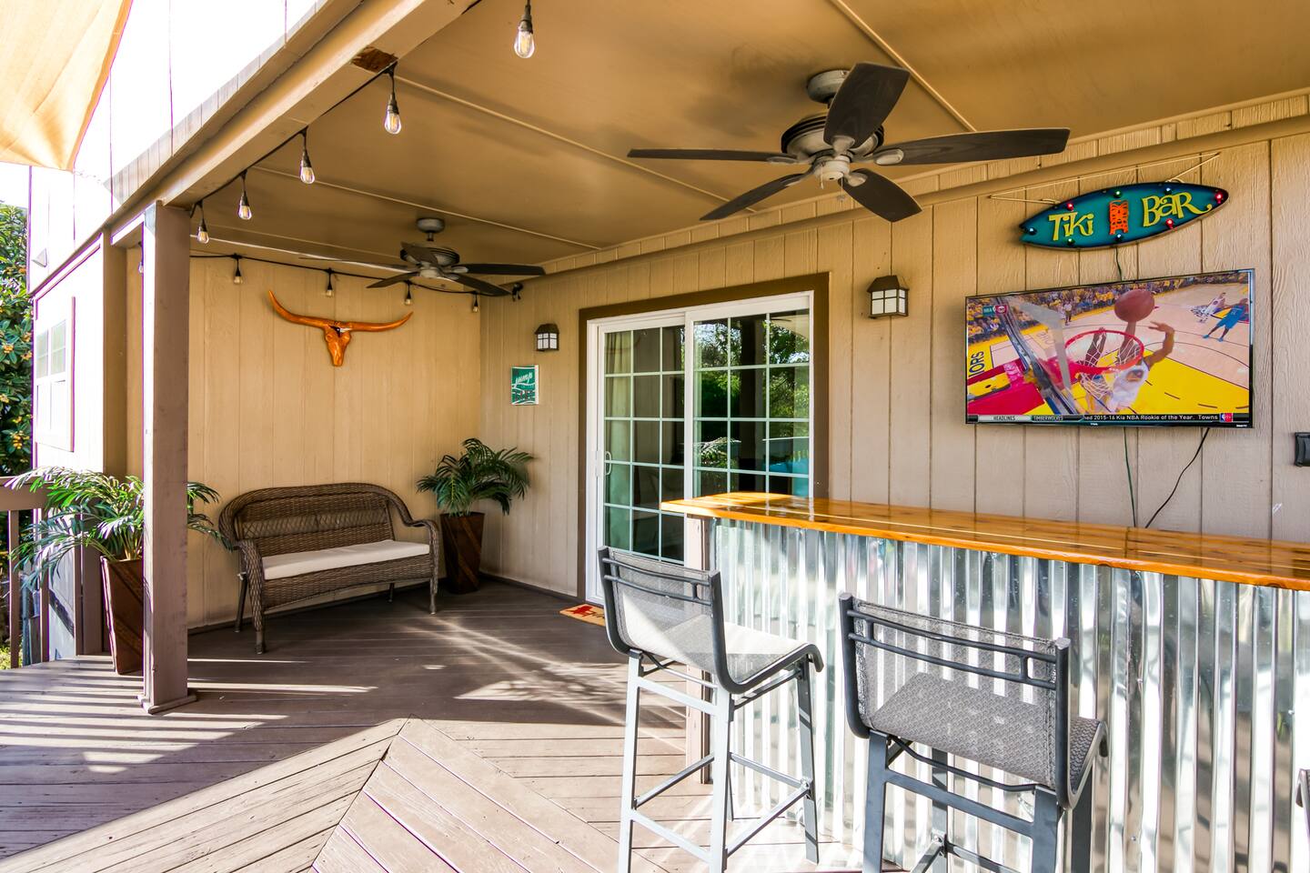 Tiki bar with TV to watch the big game