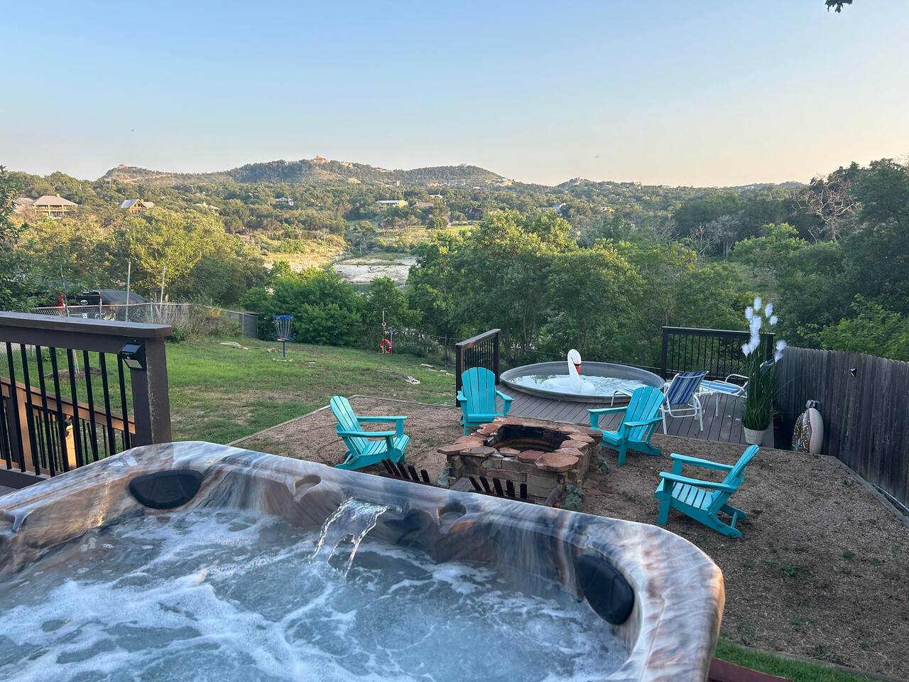 Jump in the Cove! lakefront hot tub deck in Canyon Lake, TX