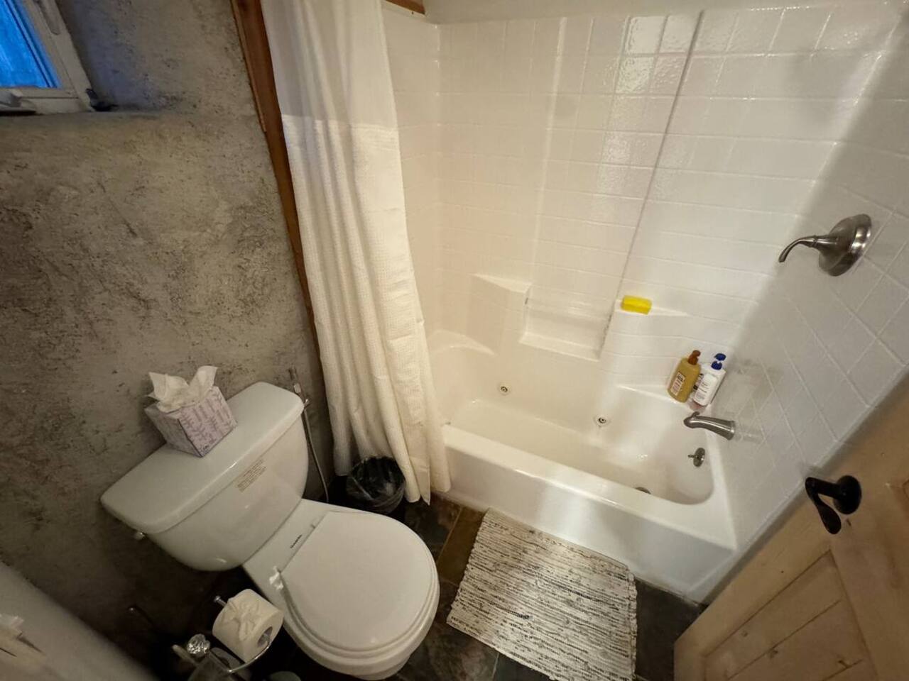 Bright, clean shower/tub combo for a refreshing start or relaxing end to your day.