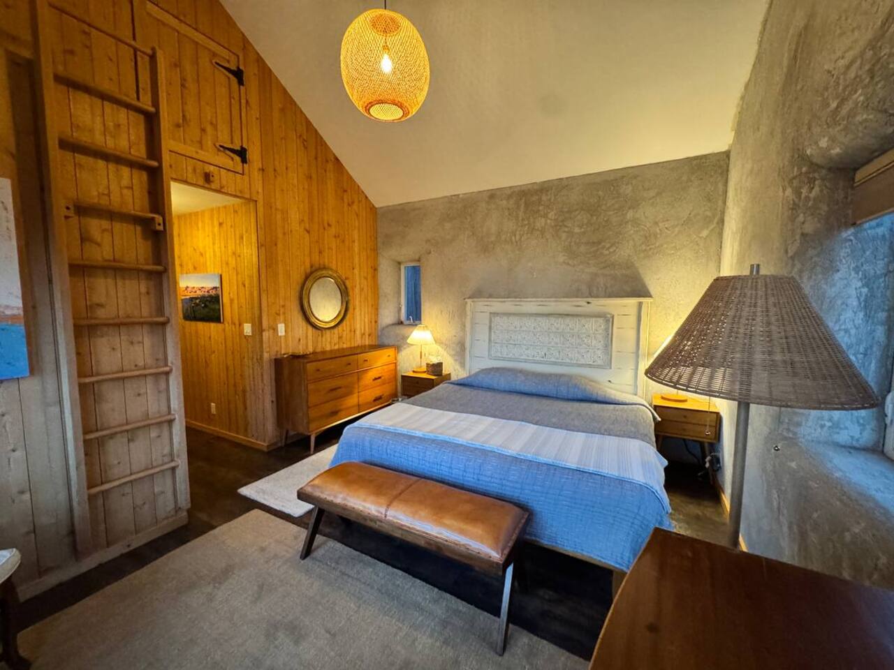 Warm and inviting master bedroom with wood accents.