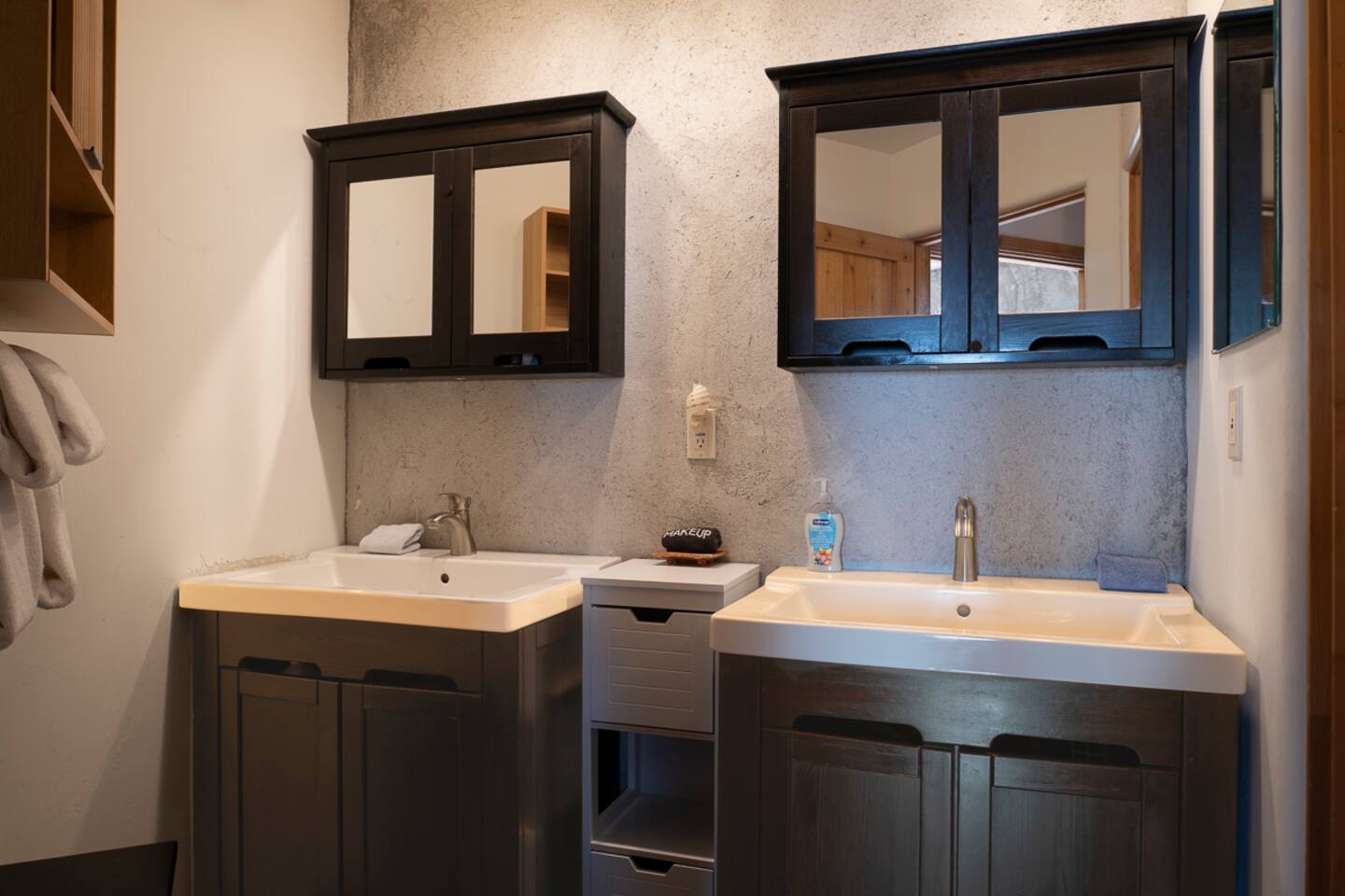 Modern bathroom with sleek finishes and natural stone tile.
