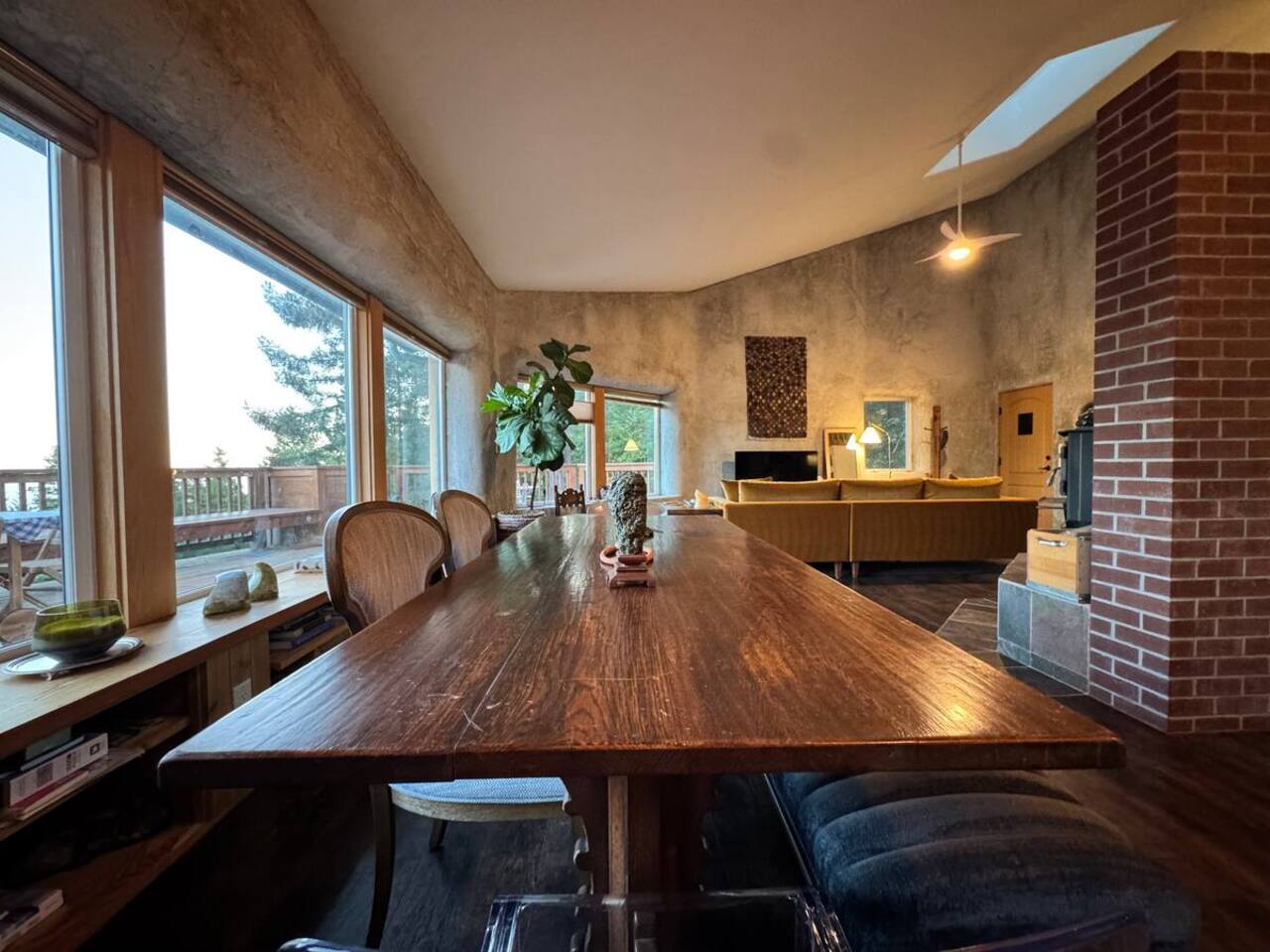 Start your mornings in a sunlit dining nook with warm wood finishes and natural light.