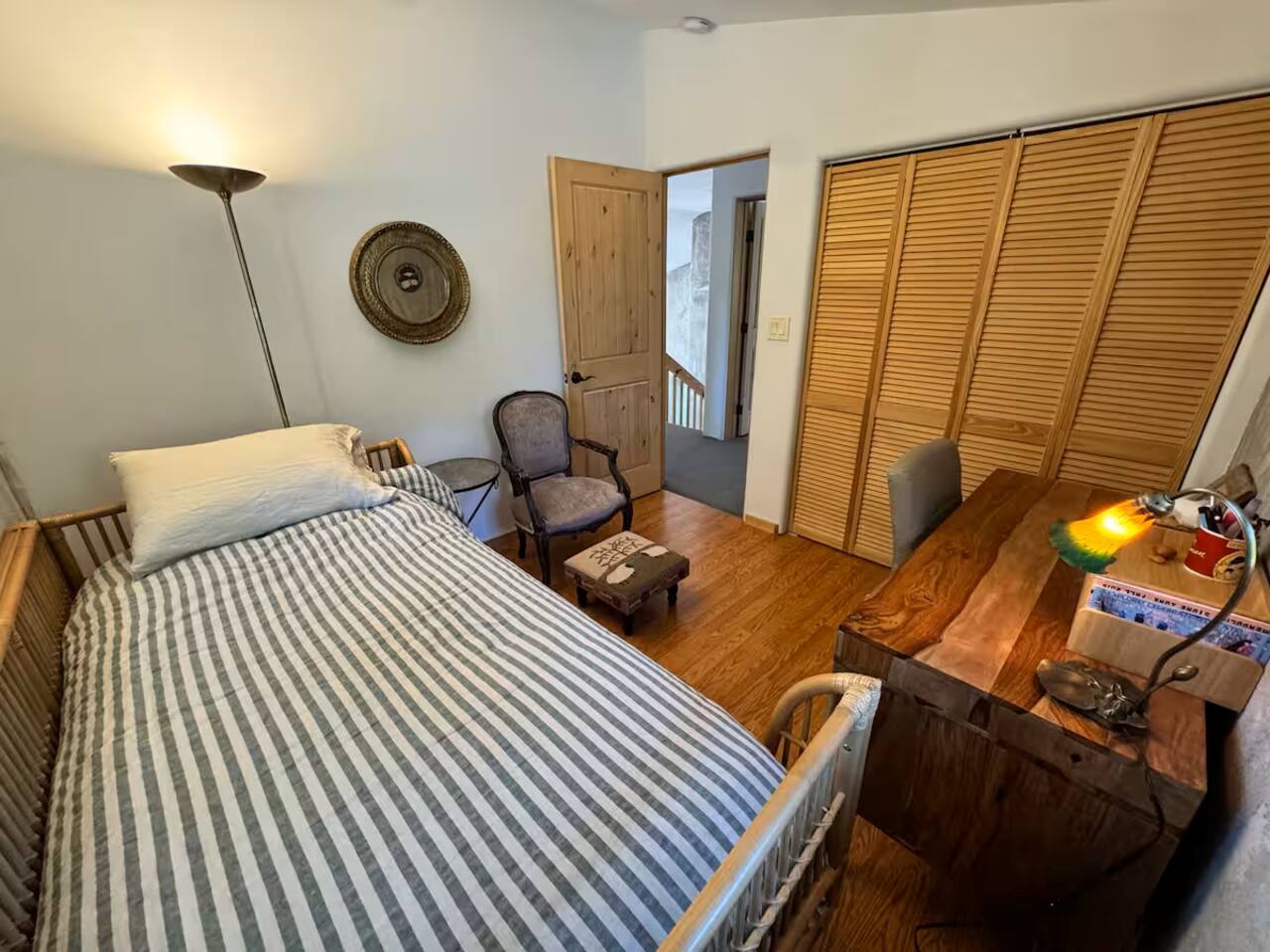 Comfortable twin bedroom with a peaceful, rustic charm.