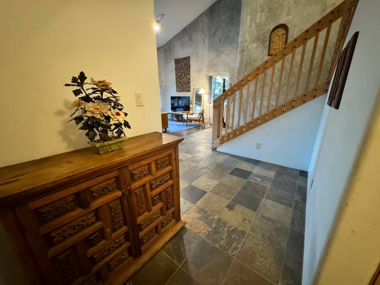 Hallway with rustic charm and stonework detail.