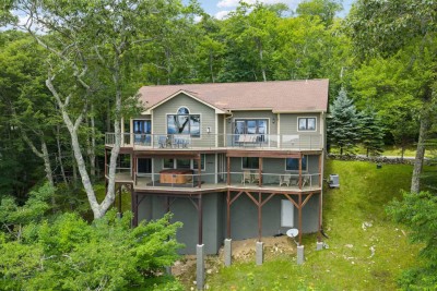 Our three-level mountain home is nestled among the trees at 4,700 feet. Relax on wrap-around decks and savor big windows inviting the outdoors in. After skiing, hiking or biking nearby, return to this peaceful retreat.