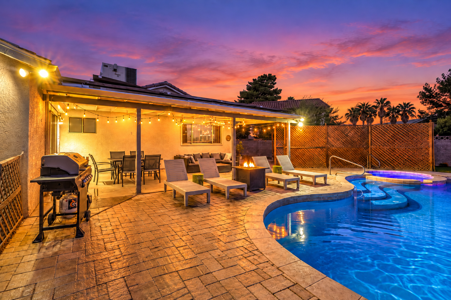 Resort-style backyard with pool, spa, fire feature & sunset patio