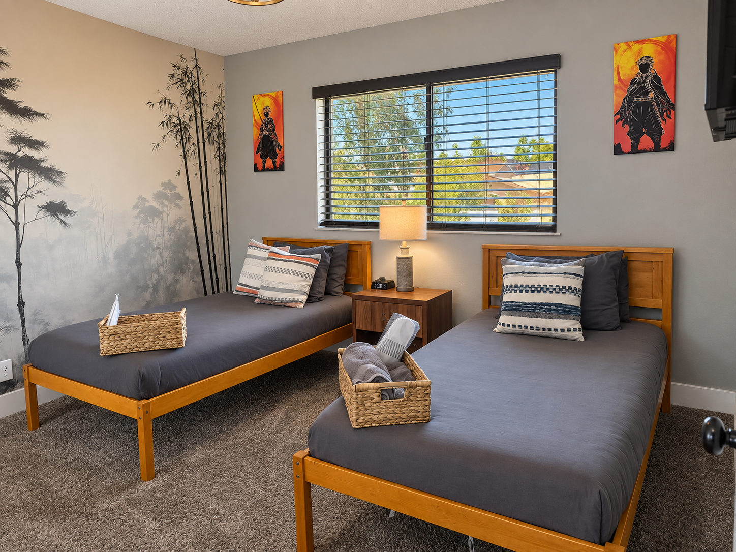 Bright twin bedroom with forest views and stylish nature-inspired decor
