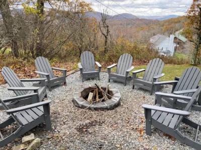 Cap off your adventures gathered around the fire pit, roasting s'mores and sharing stories as the sun sets over distant peaks. Cozy Adirondack chairs invite you to linger under starry skies.