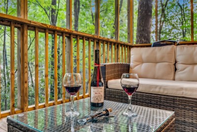 Wine on the private forest deck at Red Rose Cabin near Helen, GA