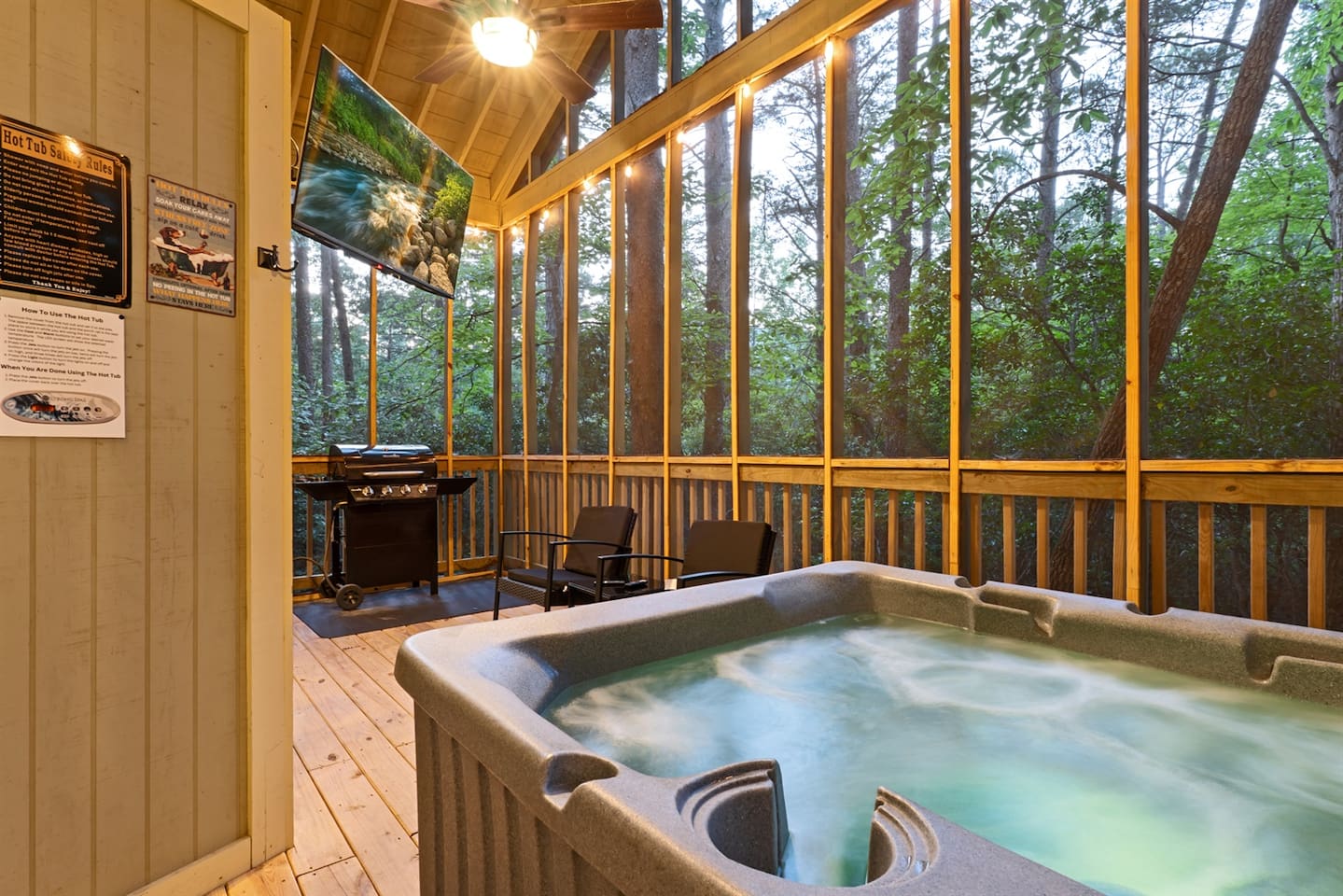 Screened porch with hot tub