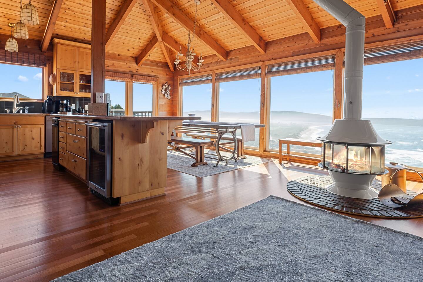 Kitchen / Dining open to the Living Area.

Large kitchen island with wine fridge.		
