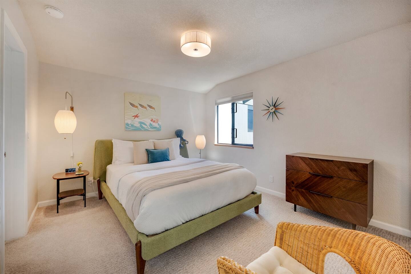 Secondary bedroom has a Queen bed, and a private entrance to the hall bathroom.